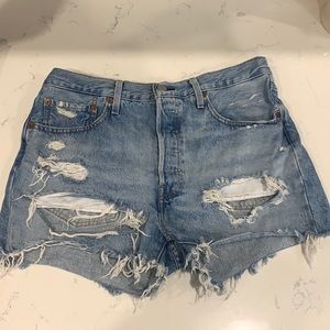 Distressed Levi’s 501 high-rise denim shorts